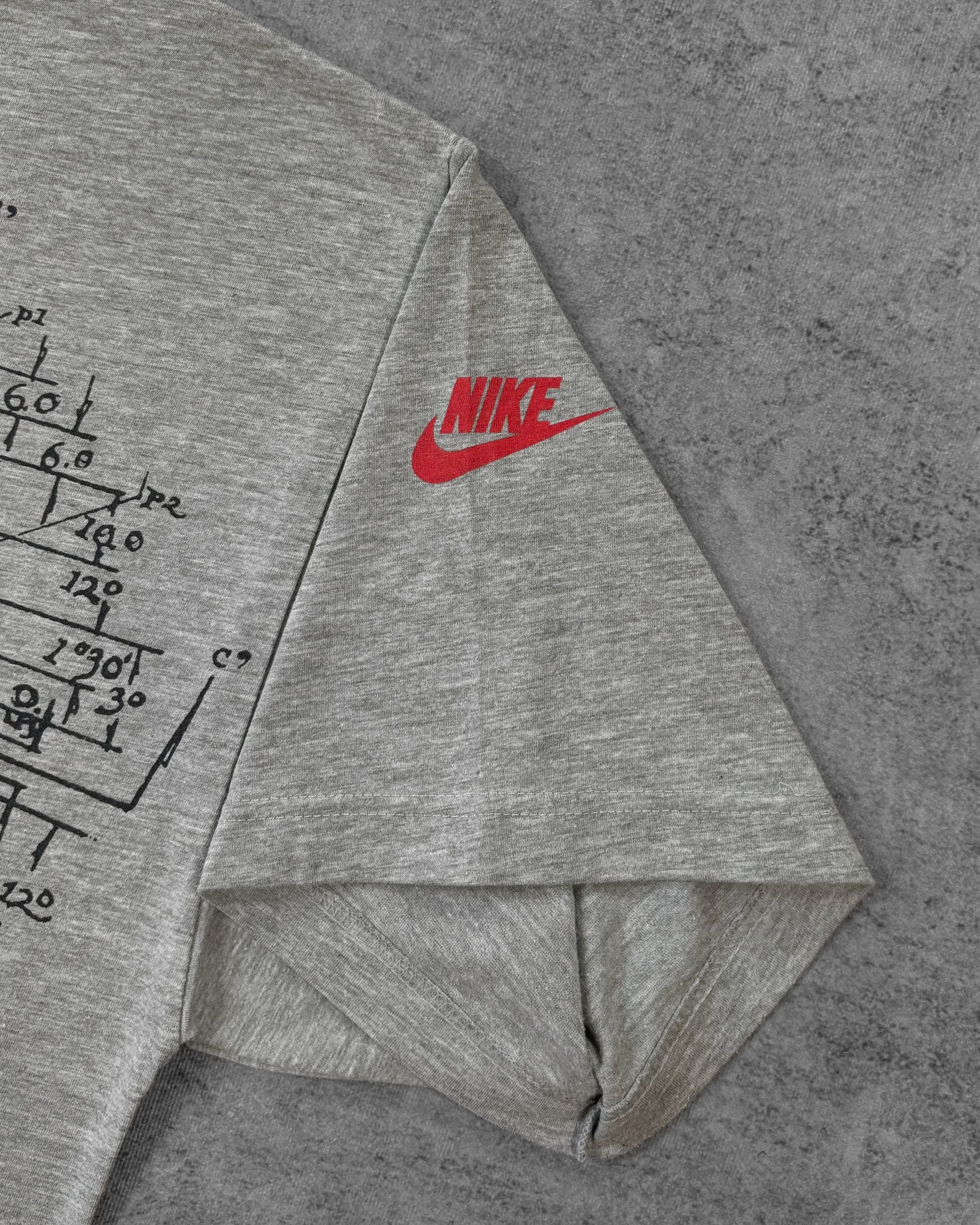 Stitching detail showing the single stitch hem on the Nike t-shirt