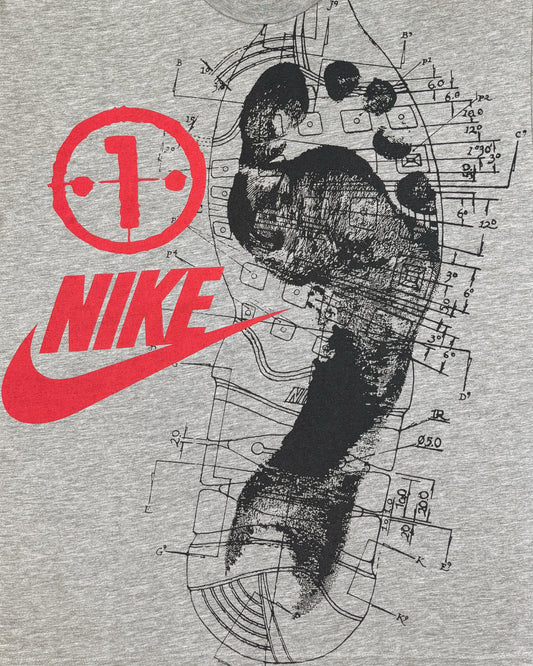 Print detail of the technical Nike Air construction illustration and red Swoosh logo on the front
