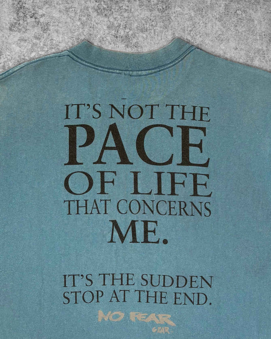 Vintage 1990s No Fear Gear Quote T-Shirt Faded Blue Graphic Tee Back Print