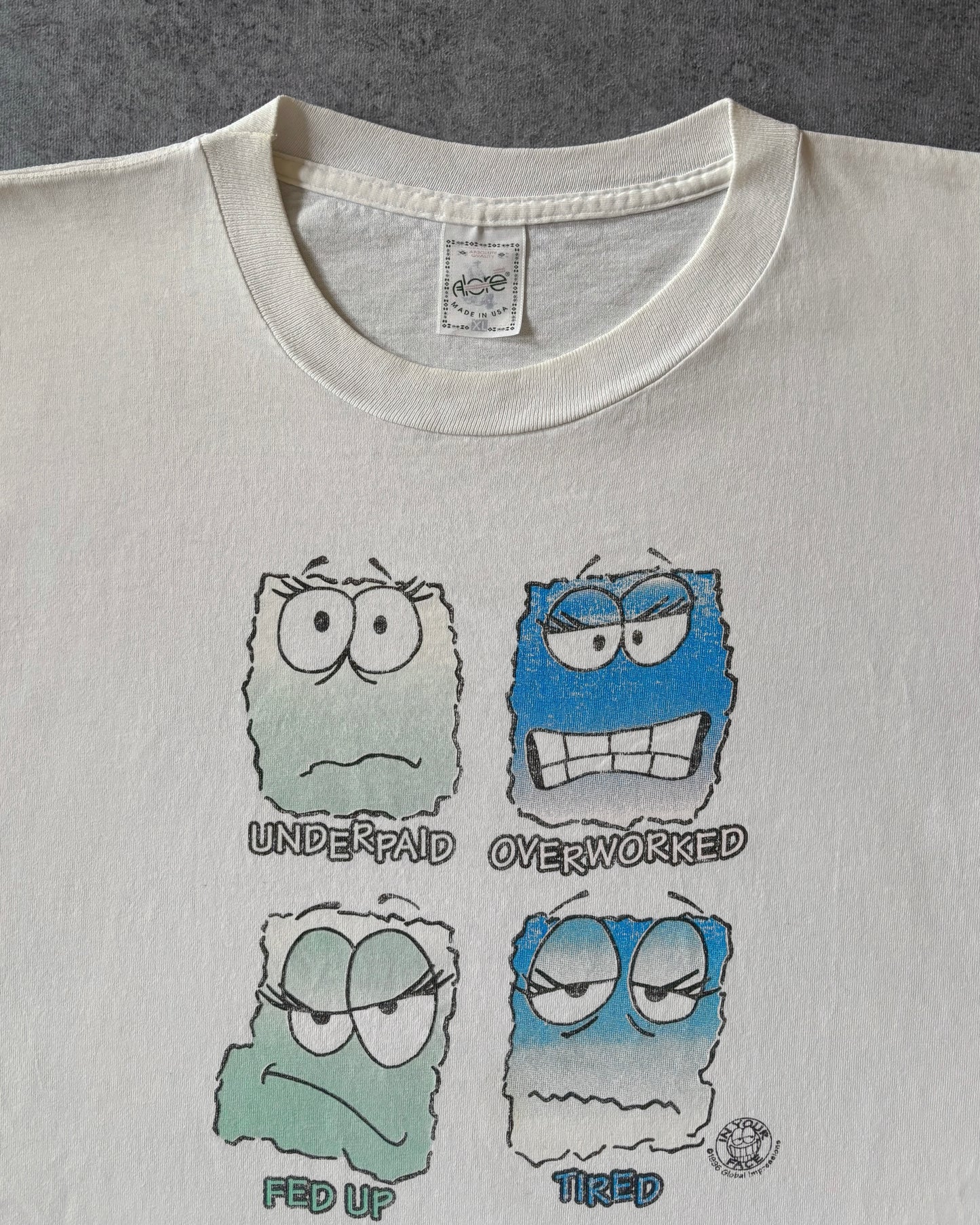 Vintage 1996 “Underpaid Overworked Fed Up Tired” T-Shirt – Aloe Tag – Made in USA