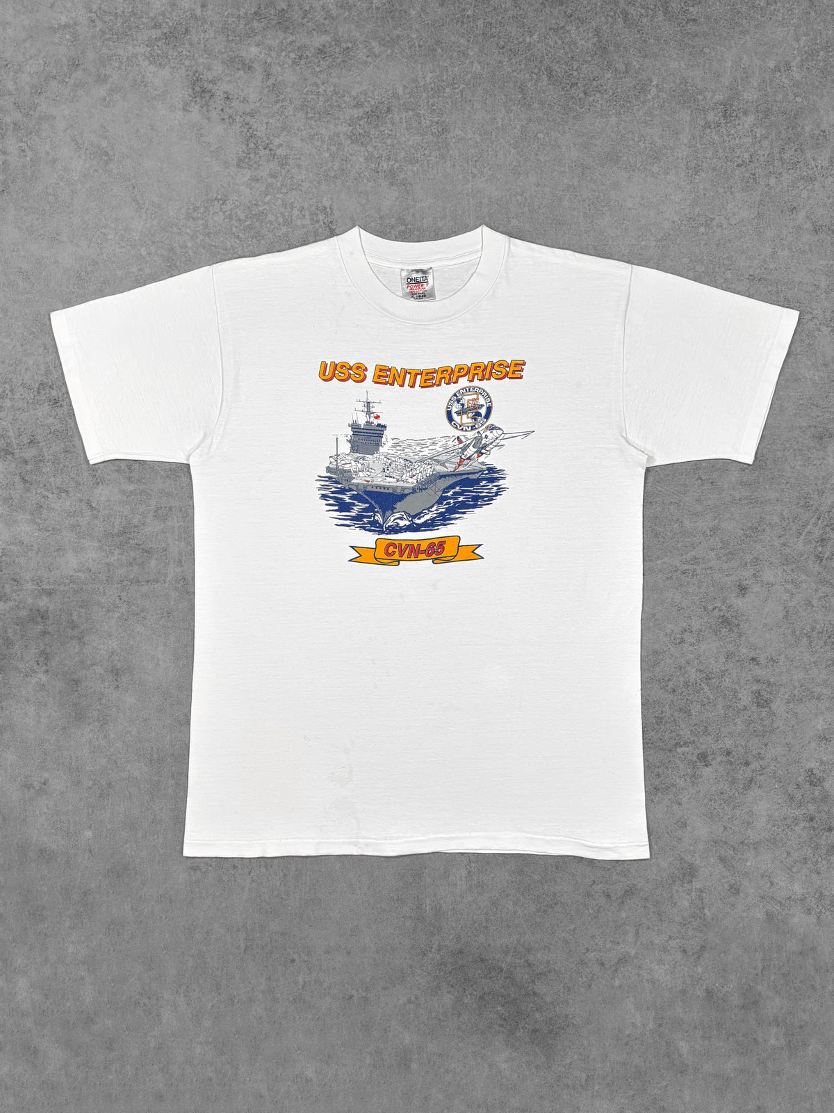Vintage 1990s USS Enterprise CVN-65 US Navy t-shirt by Oneita – front view