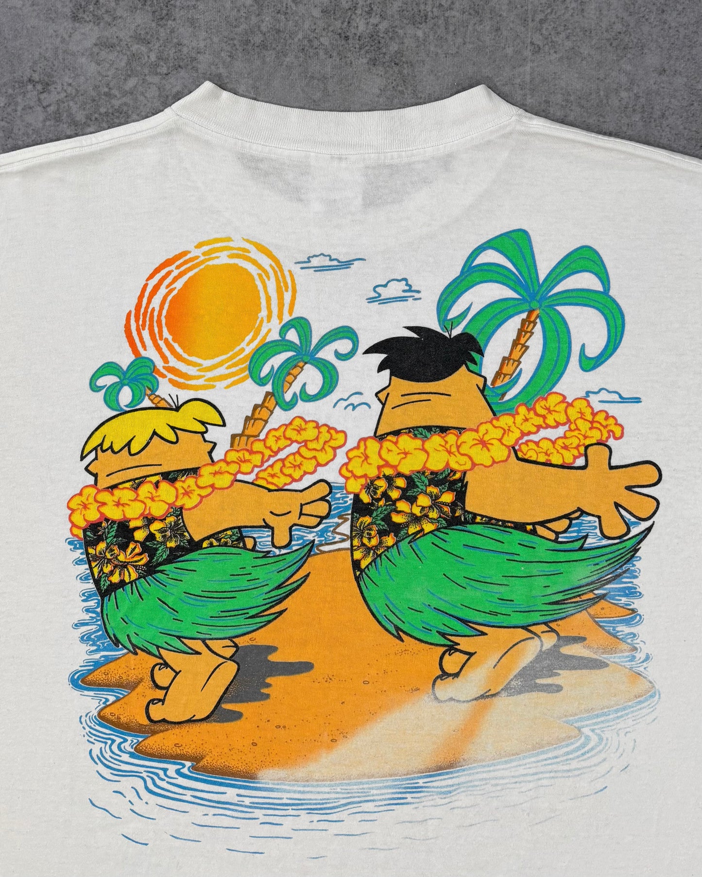 Print detail of the Flintstones graphic on the back of the shirt