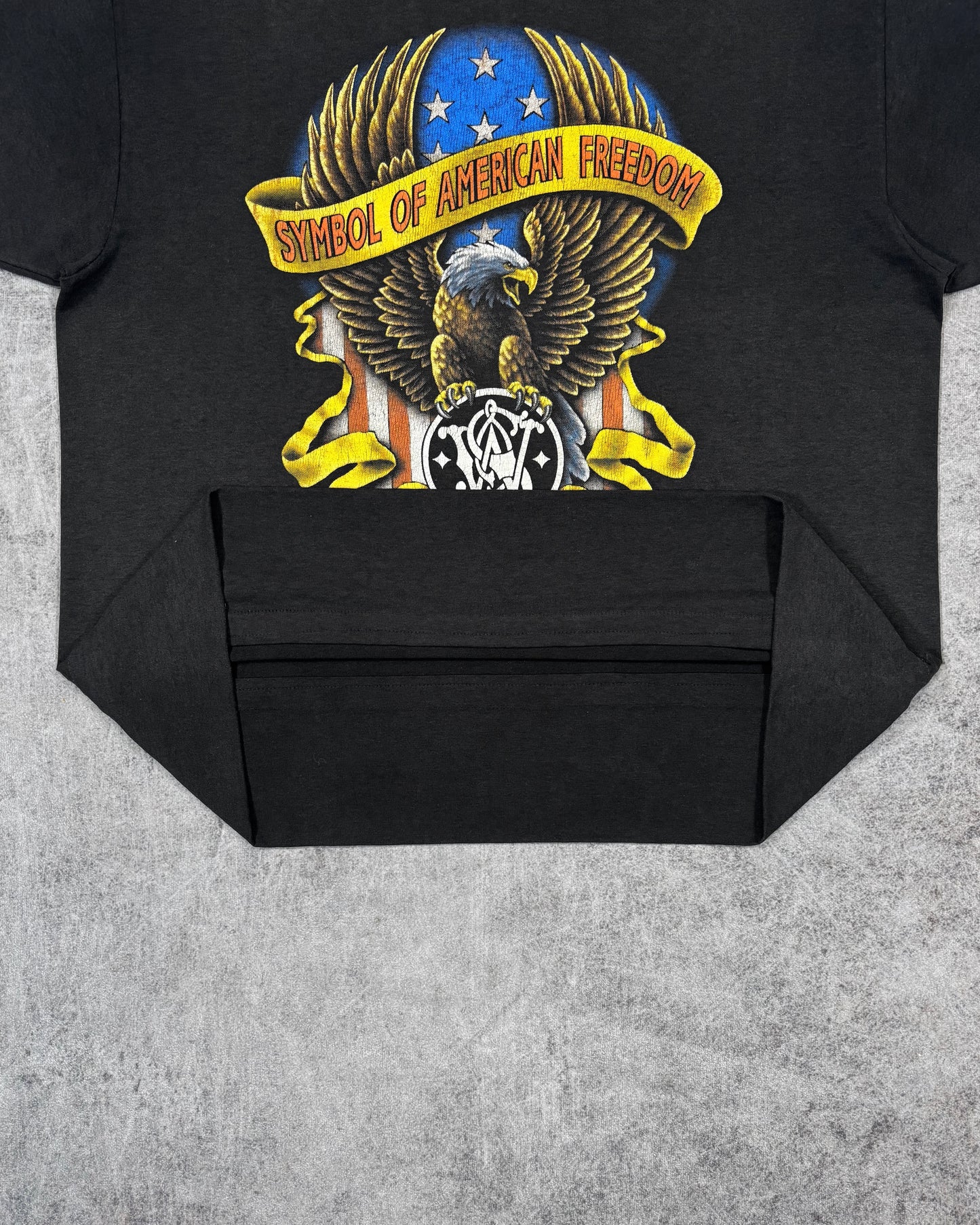 Smith and Wesson t-shirt hem detail
