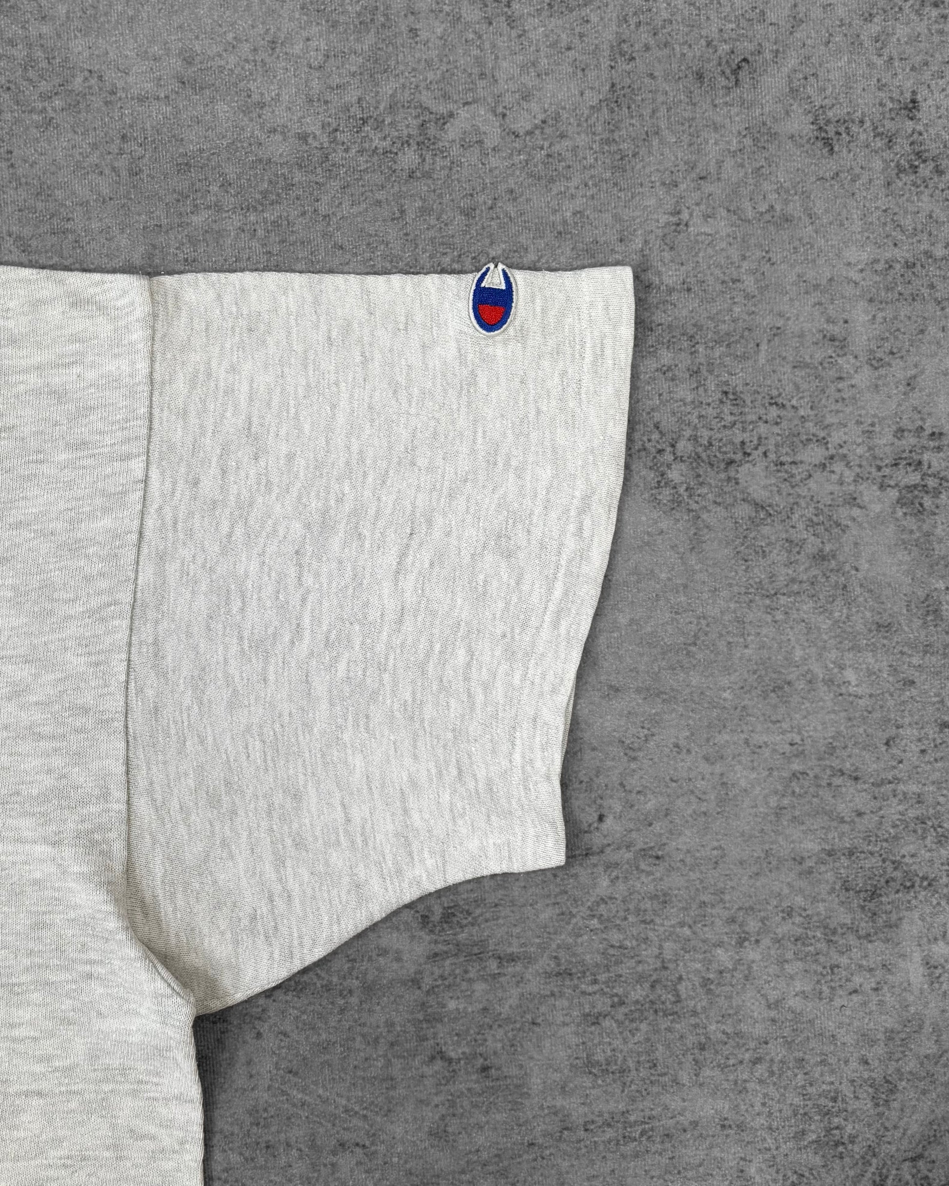 Fabric detail of the ash grey cotton and ribbed crewneck collar on the Champion t-shirt