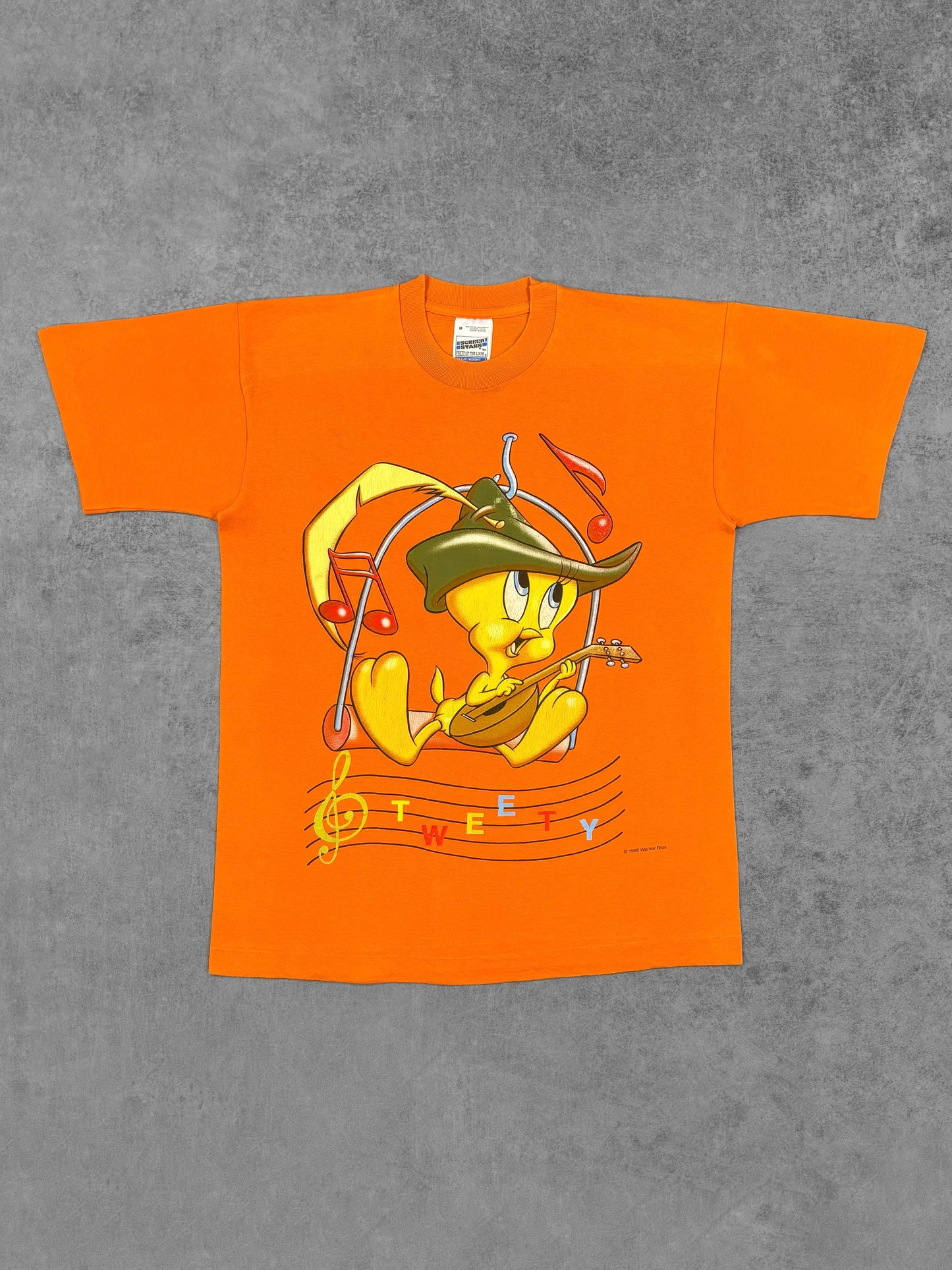 Front view of vintage 1998 Warner Bros Tweety musician graphic t-shirt