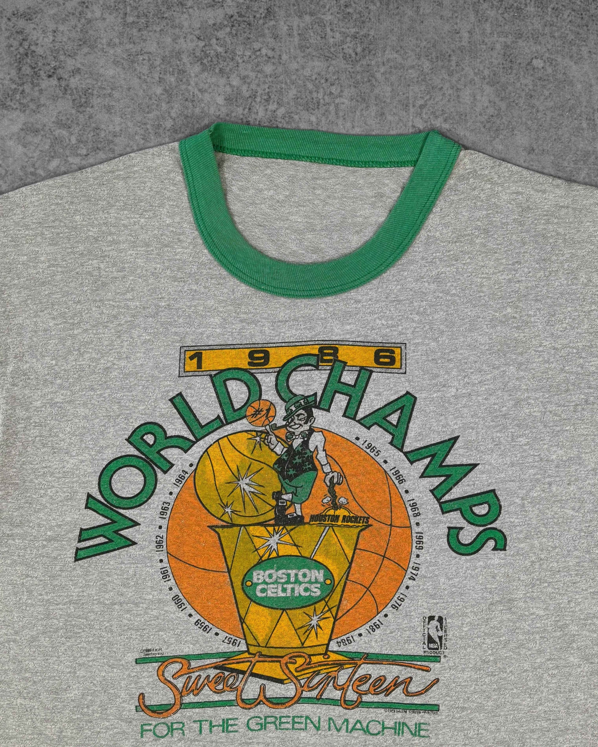 Vintage 1986 Boston Celtics ringer t-shirt, Celtics leprechaun and Larry O'Brien trophy graphic print detail