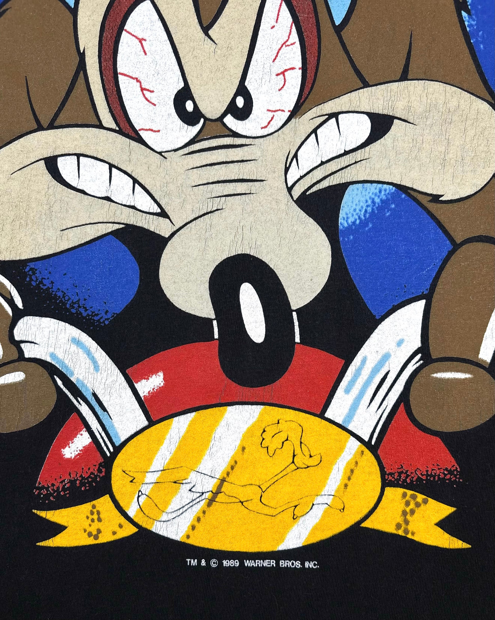 Close-up of 1989 Warner Bros copyright print at base of graphic