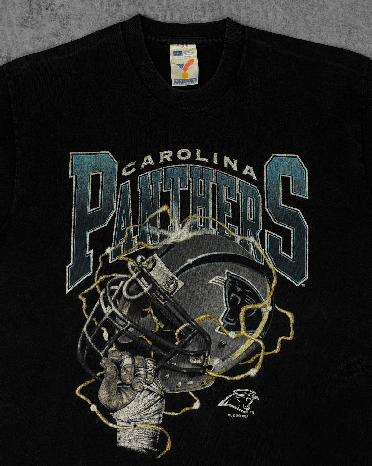 Vintage 1990s Carolina Panthers T-shirt – multicolor college lettering and helmet graphic print detail