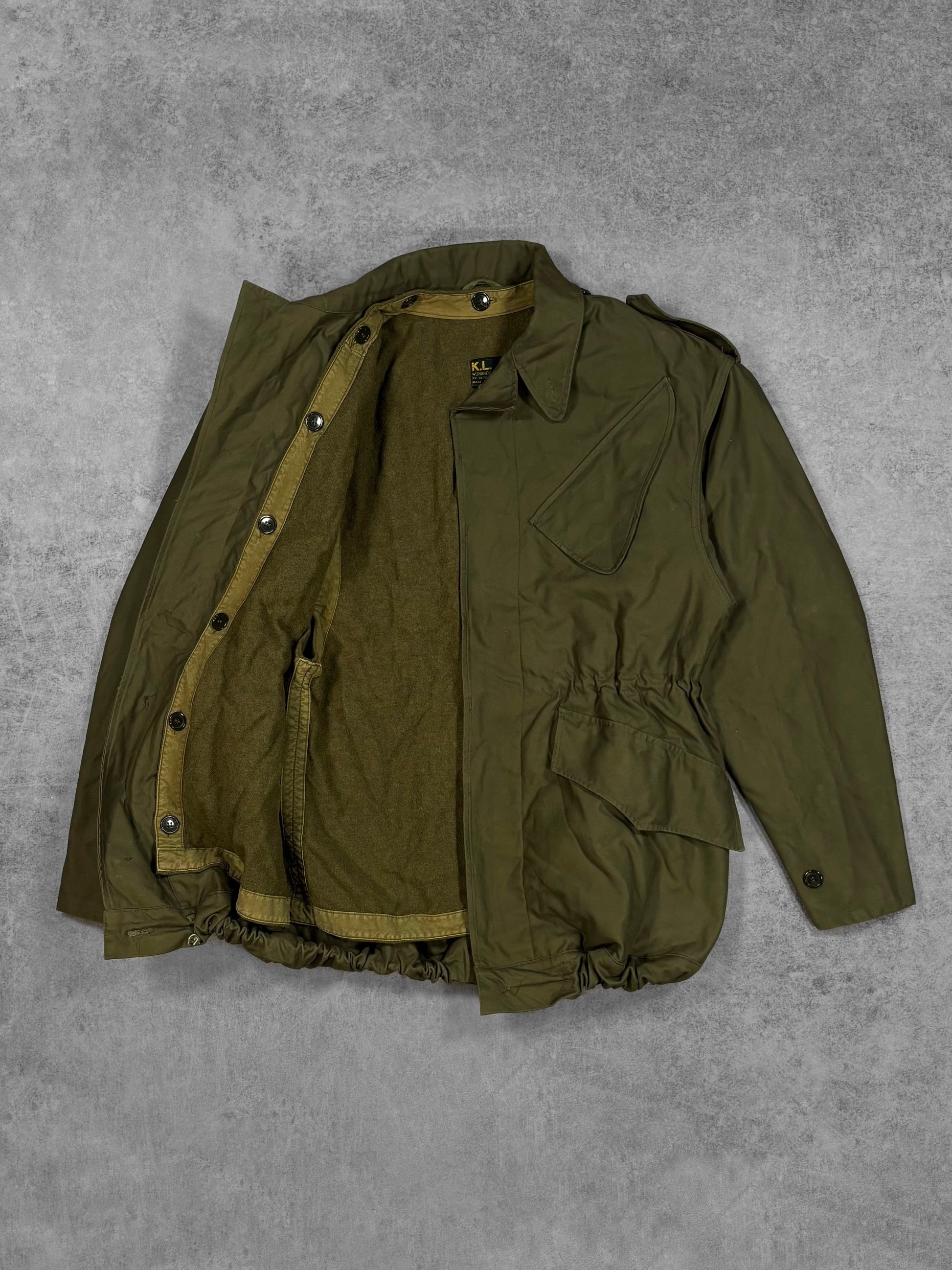Vintage 1967 Dutch Army M58 field parka – button closure detail