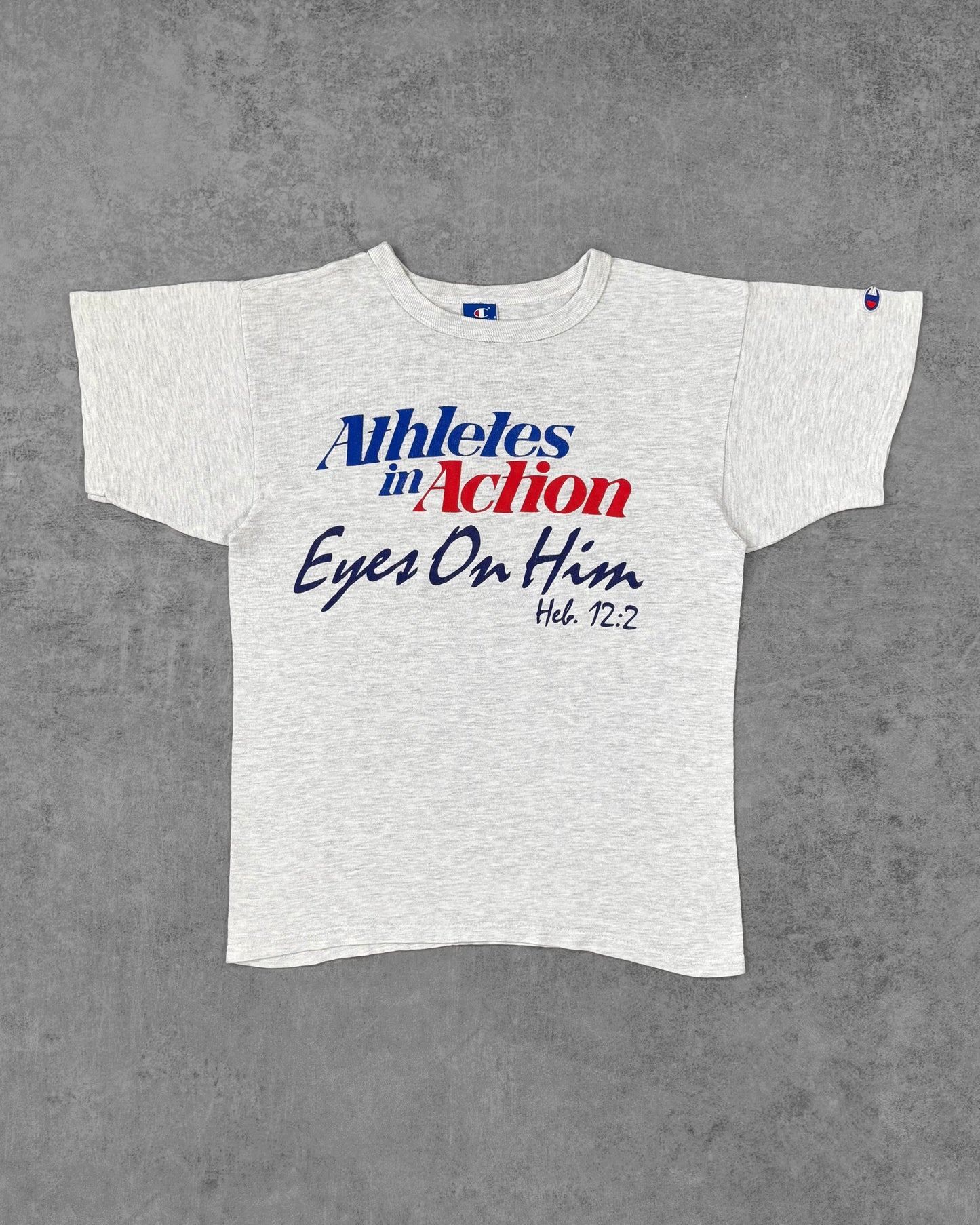 Front view of vintage 1990s Champion 'Athletes in Action' t-shirt in ash grey