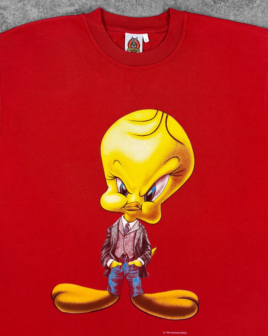 Close-up of Tweety in blazer and denim graphic print on vintage Looney Tunes crewneck