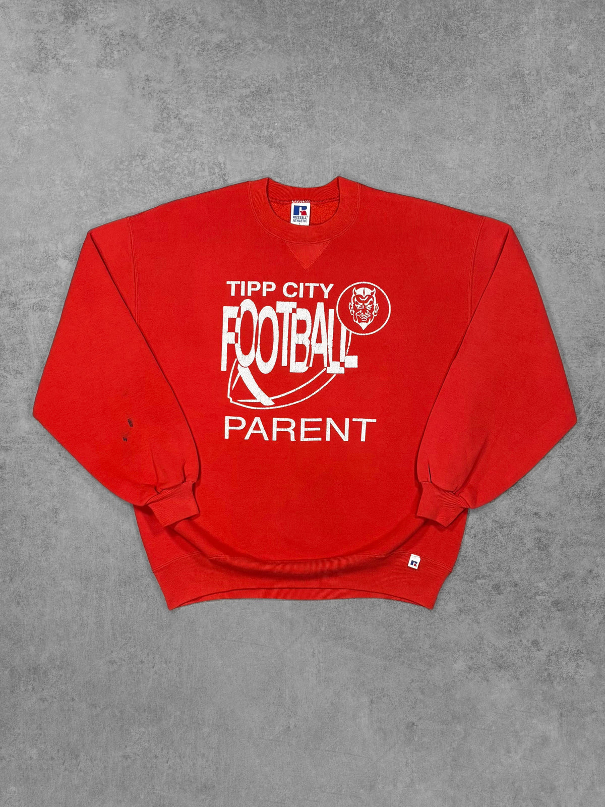 Vintage 1990s Russell Athletic red crewneck sweatshirt, Tipp City Football Red Devils graphic, Made in USA – front view
