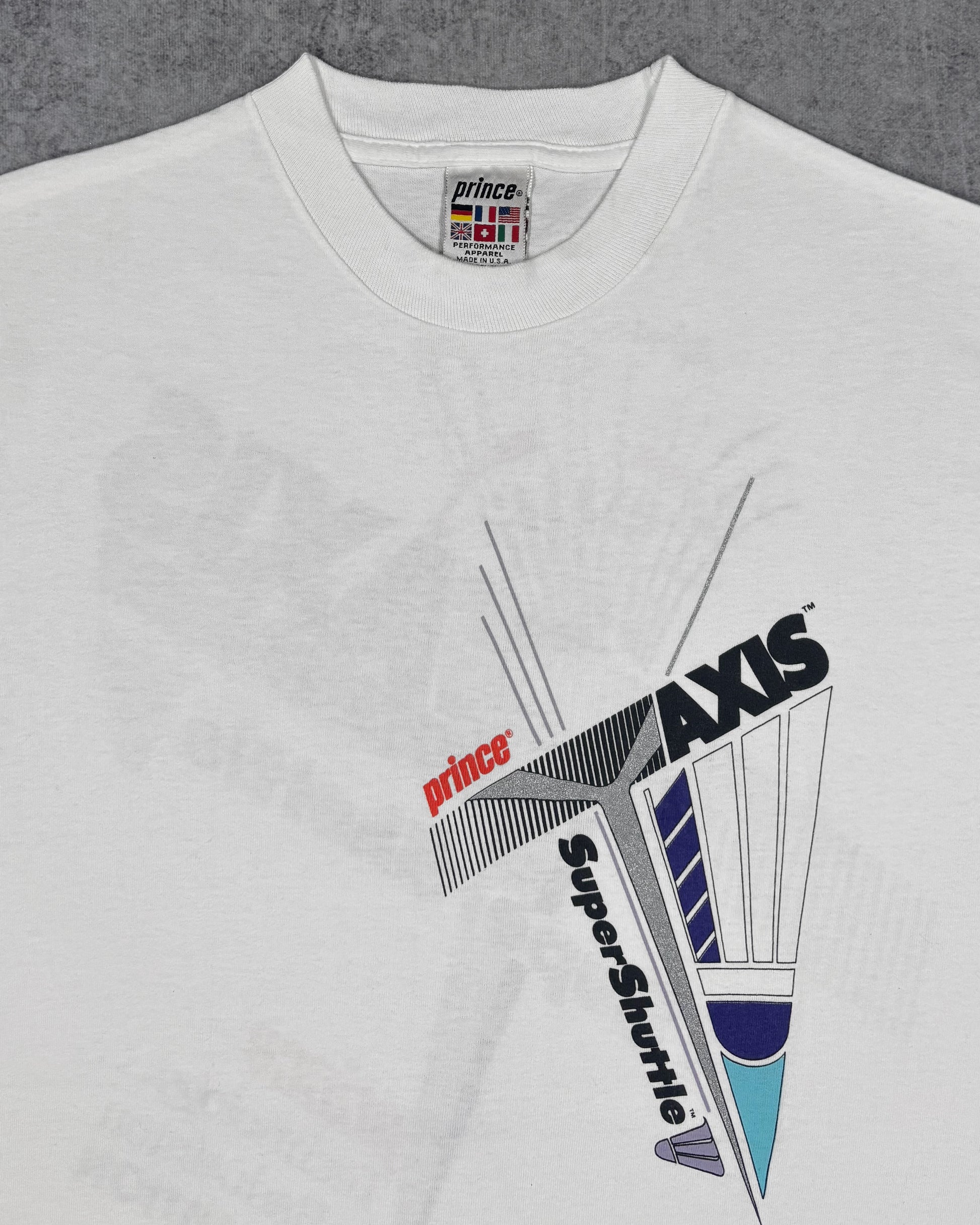 Print detail of the shuttlecock illustration and 'Prince Technology... a Badminton Revolution' slogan on the back