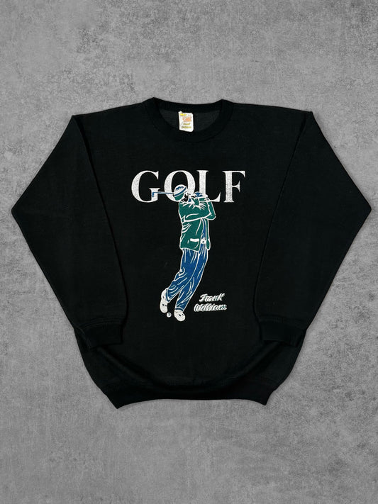 Vintage 1980s Frank William golf graphic crewneck sweatshirt, front view showing screen-printed 'GOLF' text and golfer illustration