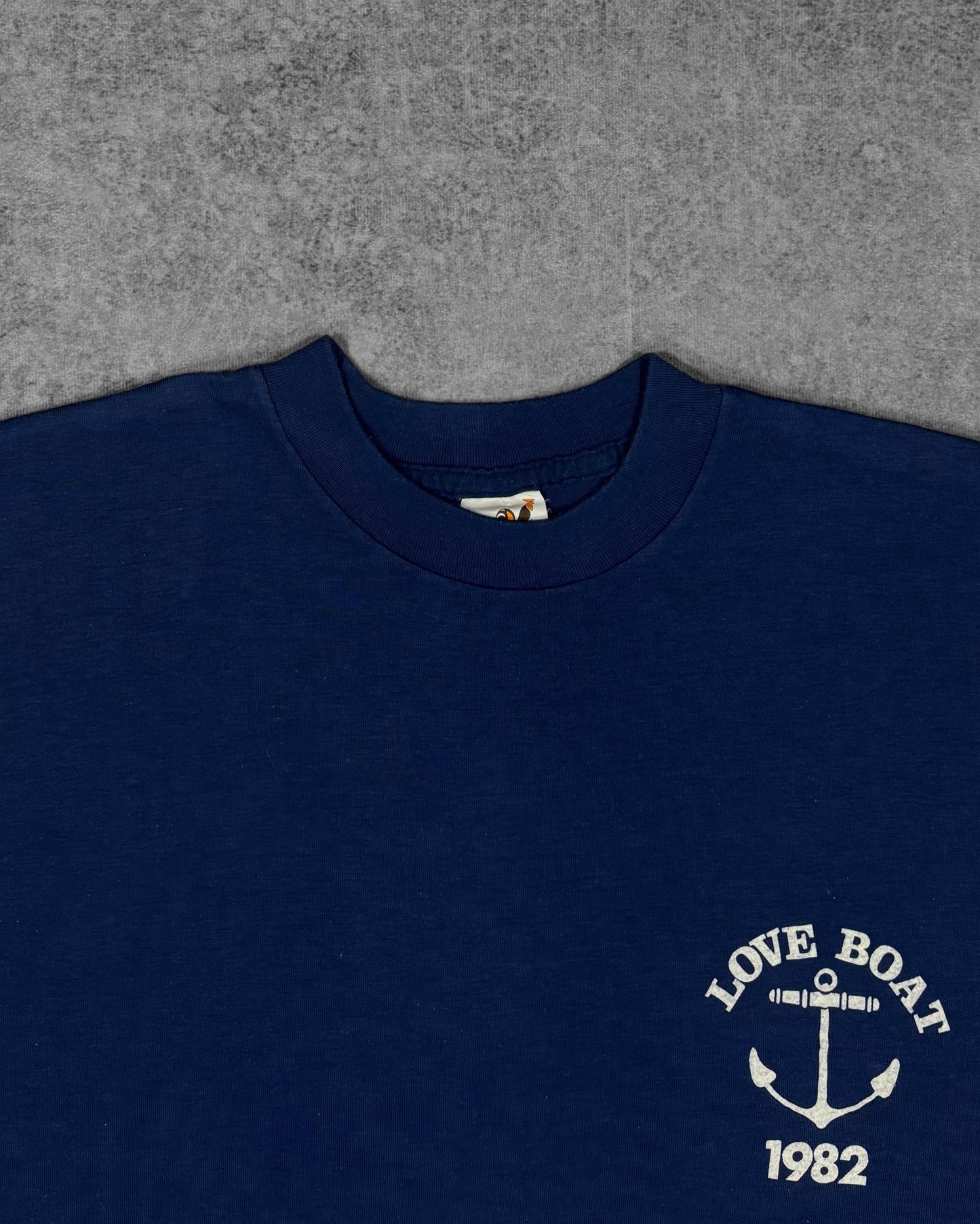 Love Boat 1982 anchor screen print graphic detail on navy t-shirt