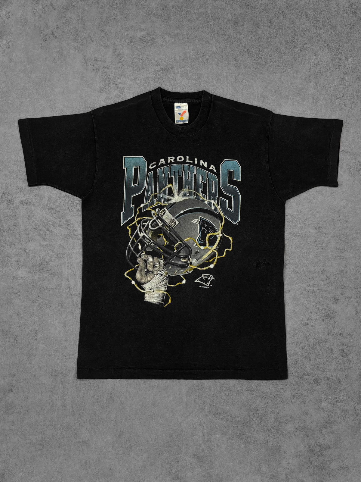 Vintage 1990s distressed Carolina Panthers NFL graphic T-shirt, Artex Made in USA – front view
