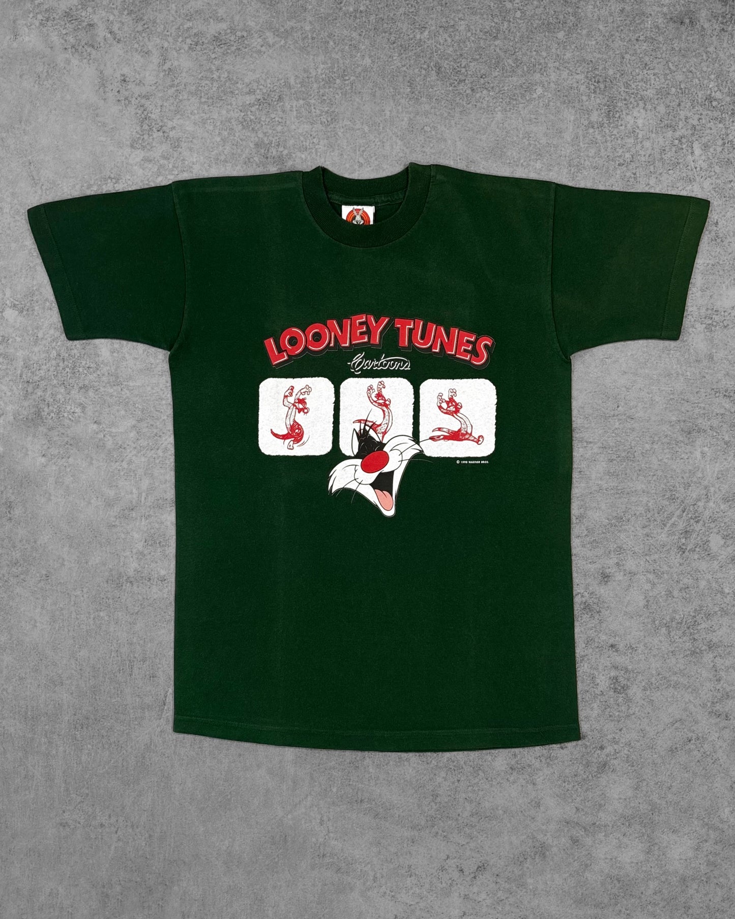 Front view of vintage 1998 Looney Tunes Sylvester graphic t-shirt in forest green, Warner Bros licensed
