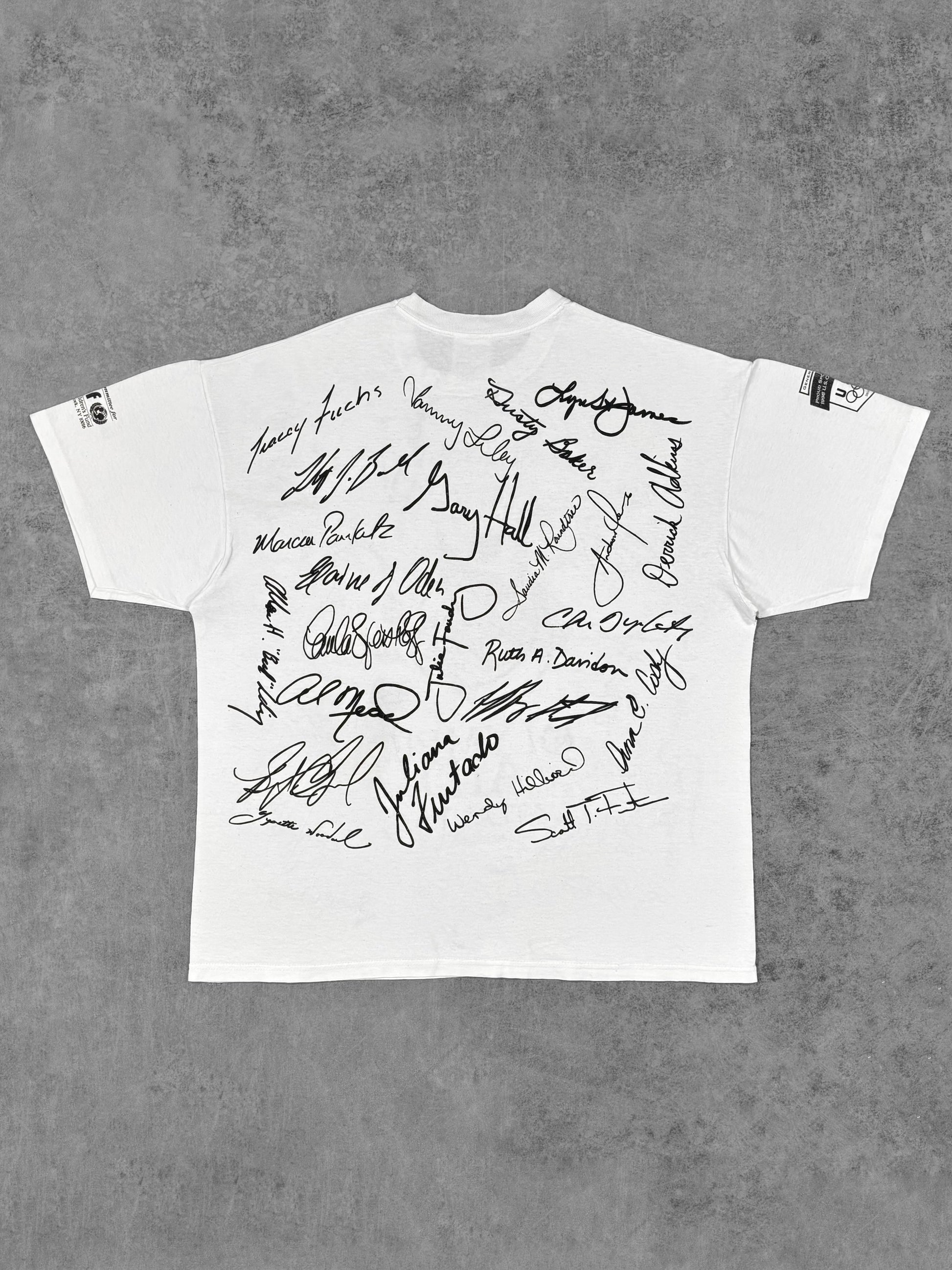 Back view of the Olympic Aid Atlanta t-shirt continuing the all-over signature print