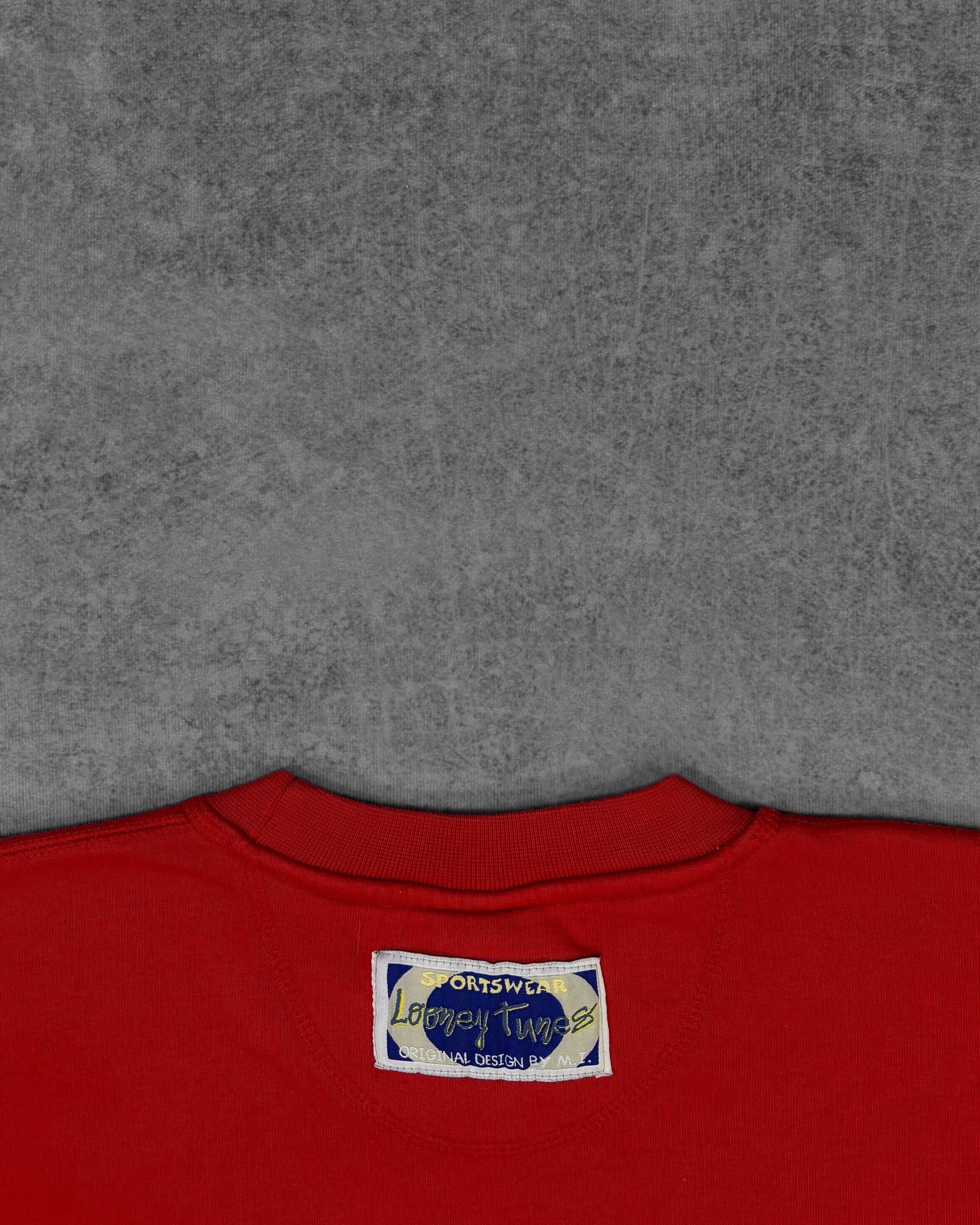Licensing tag detail inside vintage 1998 Tweety crewneck sweatshirt