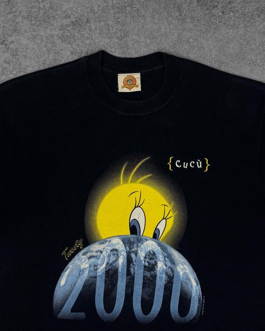 Close-up of Tweety 2000 Millennium graphic print on vintage Warner Bros t-shirt