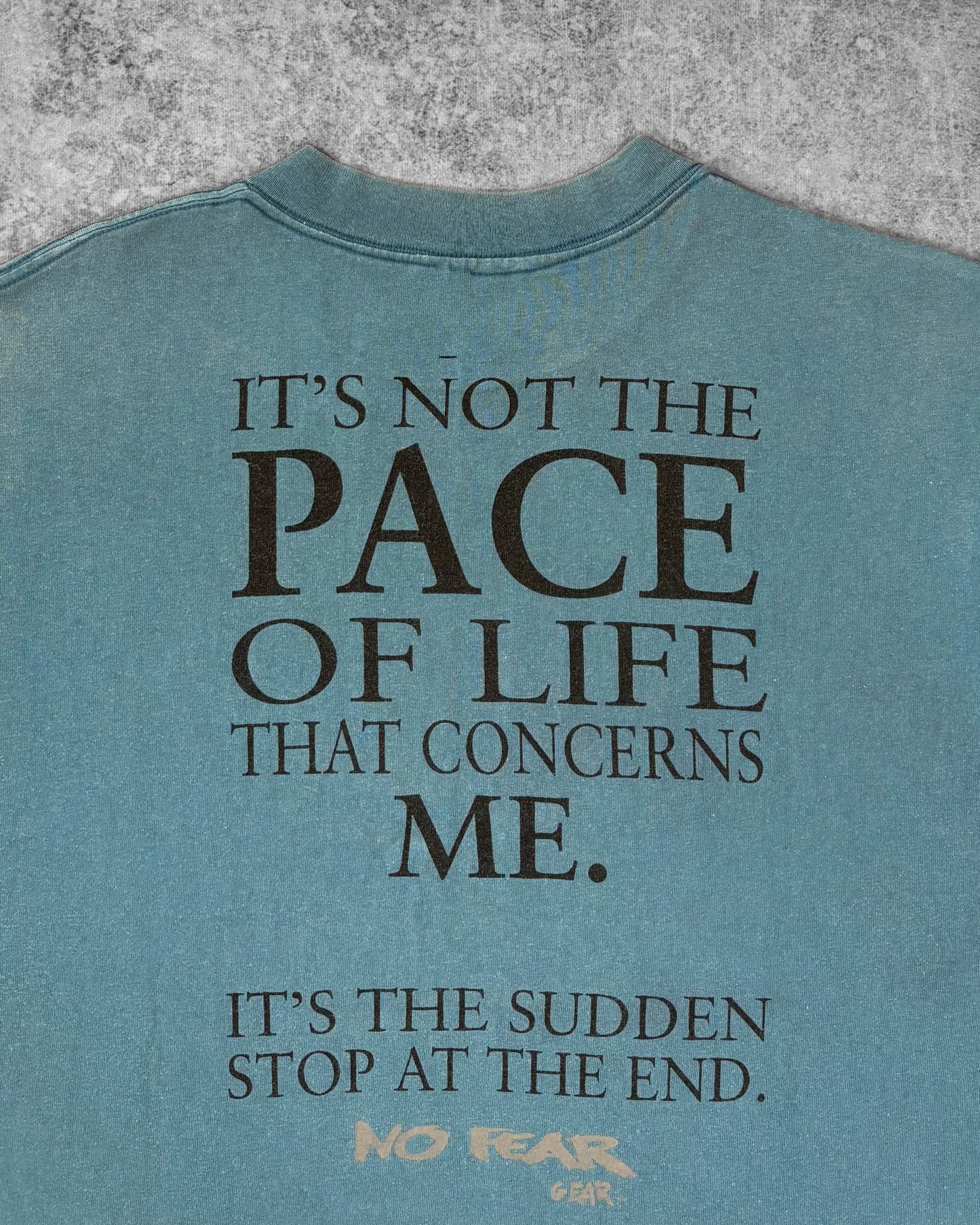Vintage 1990s No Fear Gear Quote T-Shirt Faded Blue Graphic Tee Back Print