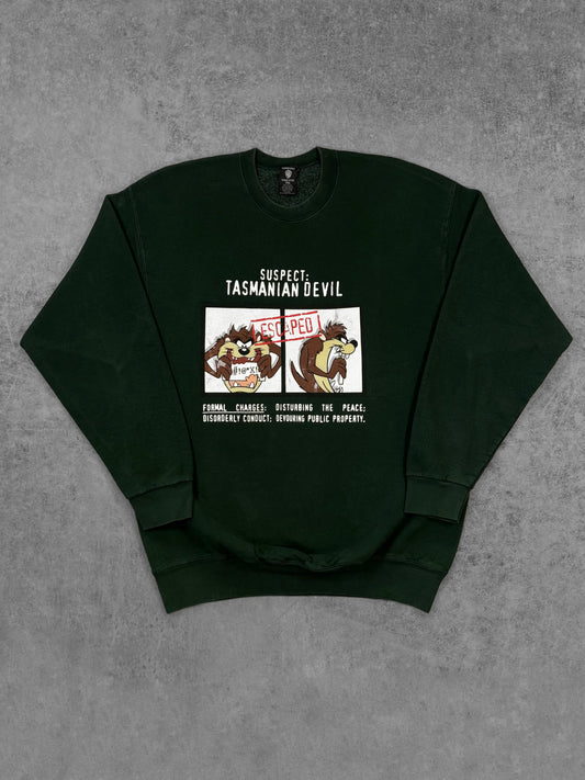 Vintage 1997 Warner Bros Taz Tasmanian Devil crewneck sweatshirt, front view with Suspect graphic print