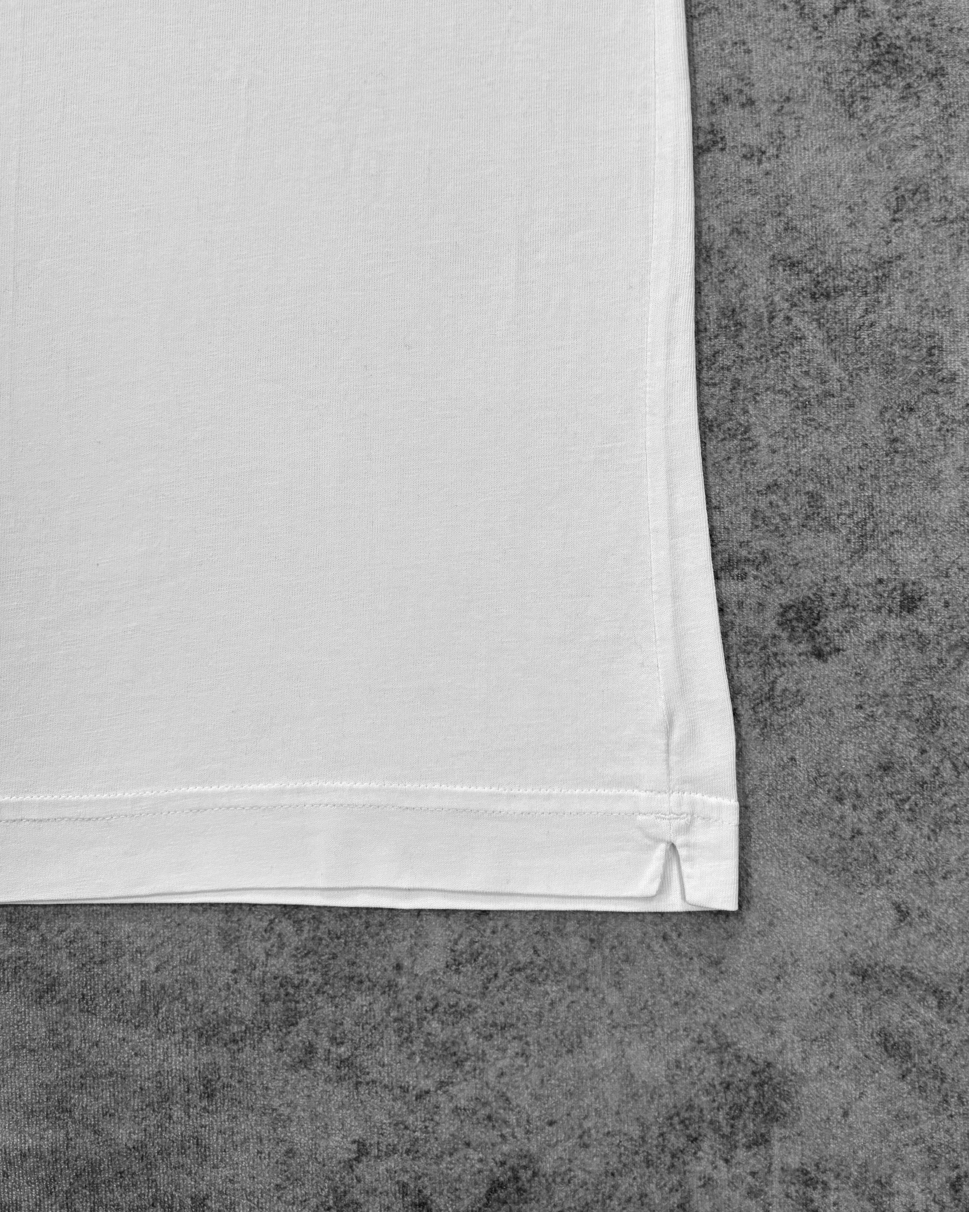 Fabric detail of the ringer t-shirt hem with coverstitch finish